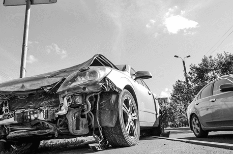 A Totaled Car in the Road After a Car Accident in Georgia